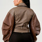 Trendy Two-Tone Faux Leather Jacket with Layered Sleeves - Xtreme Shopper